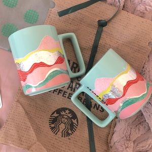 Pair of Starbucks mugs
